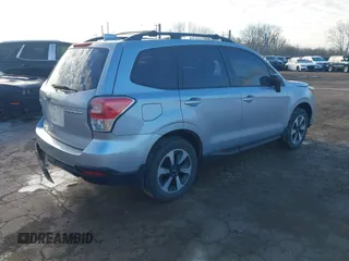 2017 Subaru Forester with VIN JF2SJABC0HH460602, listed as a IAAI auction lot 41856289 with 144,389 mi miles and . Bid and sale history available at DreamBid. Image 4.