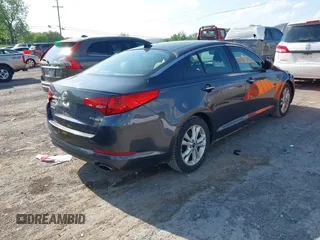 2011 Kia Optima EX with VIN KNAGN4A7XB5060289, listed as a IAAI auction lot 42149987 with 174,243 mi miles and . Bid and sale history available at carsss.com. Image 4.