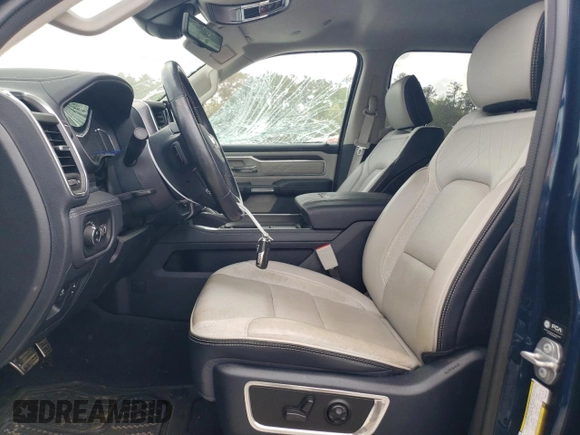 2023 Ram 1500 Limited with VIN 1C6SRFHT4PN502708, listed as a Copart auction lot 51549235 with 31,950 mi miles and Salvage title. Bid and sale history available at DreamBid. Image 7.
