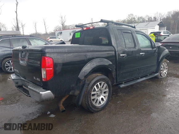 2011 Nissan Frontier Pro-4X with VIN 1N6AD0EV5BC440663, listed as a IAAI auction lot 41923918 with 168,331 mi miles and . Bid and sale history available at DreamBid. Image 4.