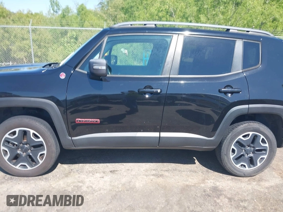 2015 Jeep Renegade Trailhawk with VIN ZACCJBCT1FPC17815, listed as a IAAI auction lot 42043290 with 247,652 mi miles and . Bid and sale history available at DreamBid. Image 14.