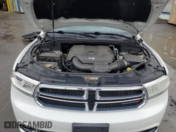 2014 Dodge Durango Limited z VIN 1C4RDJDGXEC593042, wystawiony jako Copart lot #56348355 z przebiegiem 162 094 mil mil oraz Szkoda całkowita • Salvage title. Historia ofert i sprzedaży dostępna na DreamBid. Obrazek 12.