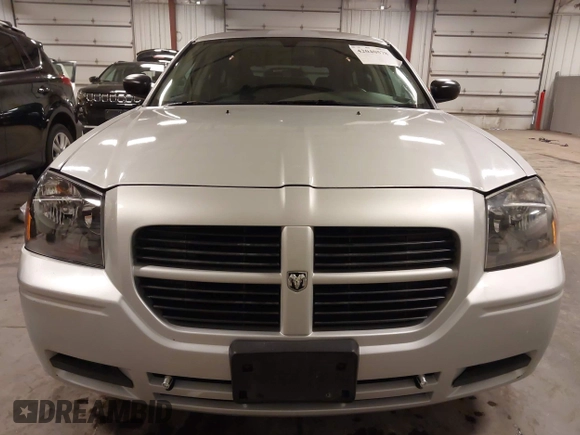 2005 Dodge Magnum z VIN 2DRGZR8V15H587486, wystawiony jako IAAI lot #42040578 z przebiegiem 179 158 mil mil oraz . Historia ofert i sprzedaży dostępna na DreamBid. Obrazek 13.