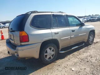 2003 GMC Envoy SLE with VIN 1GKDS13S532176330, listed as a IAAI auction lot 41757554 with 274,878 mi miles. Bid and sale history available at carsss.com. Image 4.