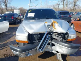 2004 Dodge Dakota Sport with VIN 1D7HG38K44S591424, listed as a IAAI auction lot 41645873 with 135,396 mi miles. Bid and sale history available at carsss.com. Image 12.