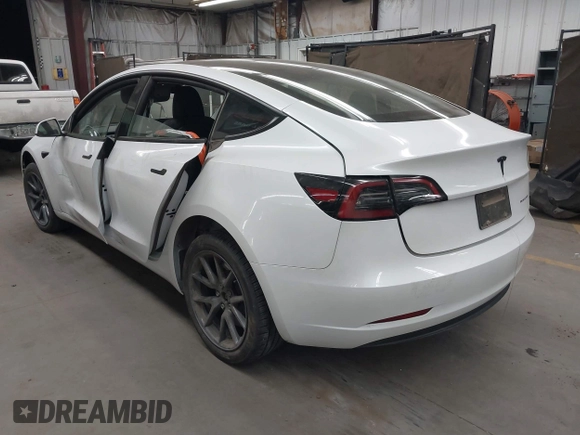 2023 Tesla Model 3 Long Range with VIN 5YJ3E1EB3PF603955, listed as a IAAI auction lot 41915541 with 33,691 mi miles and . Bid and sale history available at DreamBid. Image 3.
