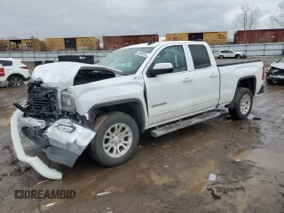 2019 GMC Sierra 1500 Limited SLE with VIN 2GTV2MEC1K1182101, listed as a Copart auction lot 43940555 with 89,520 mi miles and Salvage Title. Bid and sale history available at carsss.com. Image 1.