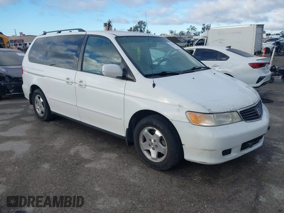 2000 Honda Odyssey EX z VIN 2HKRL1863YH589248, wystawiony jako IAAI lot #41735692 z przebiegiem 164 677 mil mil oraz . Historia ofert i sprzedaży dostępna na DreamBid. Obrazek 1.