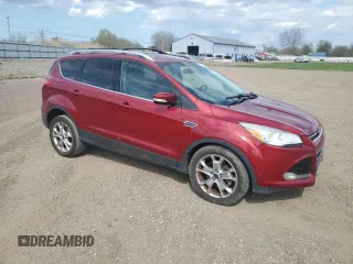 2014 Ford Escape Titanium with VIN 1FMCU9J94EUE49129, listed as a Copart auction lot 54357125 with 205,519 mi miles and Salvage Title. Bid and sale history available at carsss.com. Image 4.