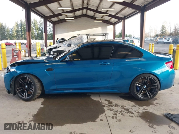 2018 BMW M2 z VIN WBS1J5C59JVA12718, wystawiony jako IAAI lot #41796602 z przebiegiem 53 707 mil mil oraz . Historia ofert i sprzedaży dostępna na DreamBid. Obrazek 15.
