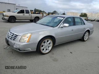 2007 Cadillac DTS Luxury I z VIN 1G6KD57Y07U182956, wystawiony jako Copart lot #56009395 z przebiegiem 164 052 mil mil oraz Szkoda całkowita • Salvage title. Historia ofert i sprzedaży dostępna na DreamBid. Obrazek 1.