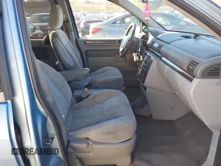 2007 Ford Freestar SEL z VIN 2FMZA522X7BA34970, wystawiony jako IAAI lot #40849269 z przebiegiem 261 928 mil mil oraz . Historia ofert i sprzedaży dostępna na DreamBid. Obrazek 5.