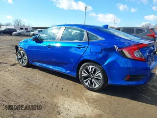2017 Honda Civic EX-T with VIN 19XFC1E33HE028257, listed as a IAAI auction lot 41395356 with 51,154 mi miles and . Bid and sale history available at DreamBid. Image 6.