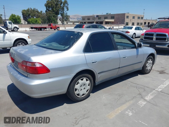 1999 Honda Accord LX with VIN JHMCG665XXC033464, listed as a IAAI auction lot 42687150 with 194,076 mi miles and . Bid and sale history available at DreamBid. Image 4.