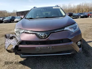2018 Toyota RAV4 XLE with VIN 2T3RFREVXJW841741, listed as a Copart auction lot 51378385 with 114,842 mi miles and Salvage Title. Bid and sale history available at carsss.com. Image 5.