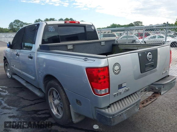 2005 Nissan Titan XE with VIN 1N6AA07A95N511746, listed as a IAAI auction lot 42190947 with 216,306 mi miles and . Bid and sale history available at DreamBid. Image 3.