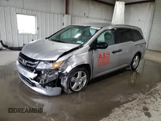 2015 Honda Odyssey LX with VIN 5FNRL5H27FB106960, listed as a Copart auction lot 51207935 with 144,668 mi miles and Salvage Title. Bid and sale history available at DreamBid. Image 1.