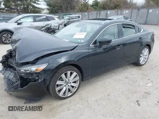 2021 Mazda Mazda6 Touring with VIN JM1GL1VM1M1604566, listed as a IAAI auction lot 41728787 with 68,636 mi miles. Bid and sale history available at carsss.com. Image 17.