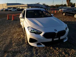 2023 BMW 2 Series 228i with VIN WBA53AK04P7M66299, listed as a Copart auction lot 81856304 with 7,037 mi miles and Salvage Title. Bid and sale history available at carsss.com. Image 10.
