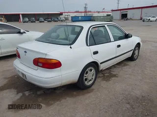 1999 Chevrolet Prizm z VIN 1Y1SK5487XZ439374, wystawiony jako IAAI lot #41746472 z przebiegiem 152 674 mil mil oraz . Historia ofert i sprzedaży dostępna na DreamBid. Obrazek 4.