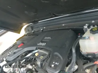 2021 Jeep Wrangler Unlimited 80th Anniversary with VIN 1C4HJXDG6MW662281, listed as a IAAI auction lot 43194178 with 52,603 mi miles and . Bid and sale history available at DreamBid. Image 20.