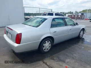 2003 Cadillac DeVille with VIN 1G6KD54Y63U115955, listed as a IAAI auction lot 41980561 with 176,624 mi miles. Bid and sale history available at carsss.com. Image 4.
