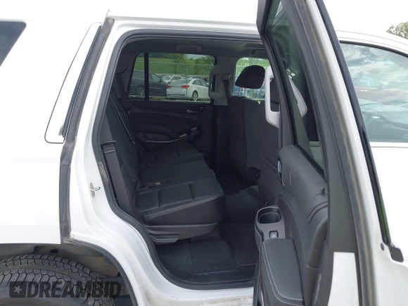 2020 Chevrolet Tahoe Commercial with VIN 1GNSKDEC2LR260646, listed as a IAAI auction lot 42800810 with 114,704 mi miles and . Bid and sale history available at DreamBid. Image 8.