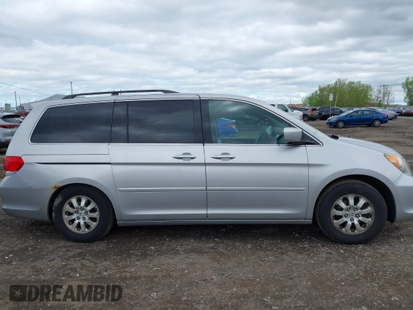 2010 Honda Odyssey EX z VIN 5FNRL3H44AB101312, wystawiony jako IAAI lot #42264744 z przebiegiem 173 917 mil mil oraz . Historia ofert i sprzedaży dostępna na DreamBid. Obrazek 14.