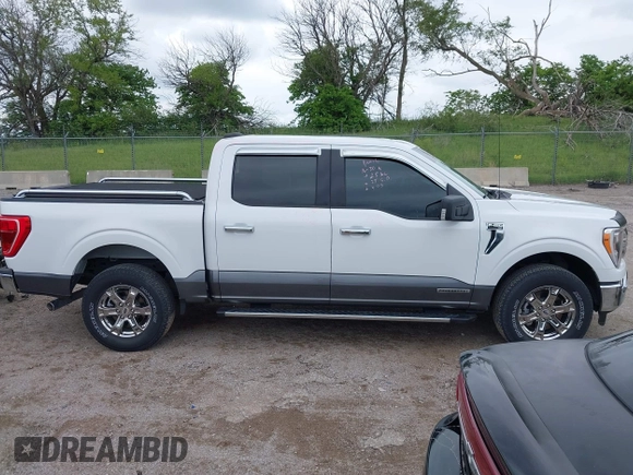2021 Ford F-150 XL z VIN 1FTFW1ED7MFB36946, wystawiony jako IAAI lot #42318029 z przebiegiem 16 960 mil mil oraz . Historia ofert i sprzedaży dostępna na DreamBid. Obrazek 13.