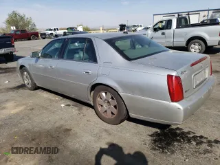 2004 Cadillac DeVille DTS z VIN 1G6KF57994U203706, wystawiony jako Copart lot #76278324 z przebiegiem 203 709 mil mil oraz Szkoda całkowita • Salvage title. Historia ofert i sprzedaży dostępna na DreamBid. Obrazek 2.