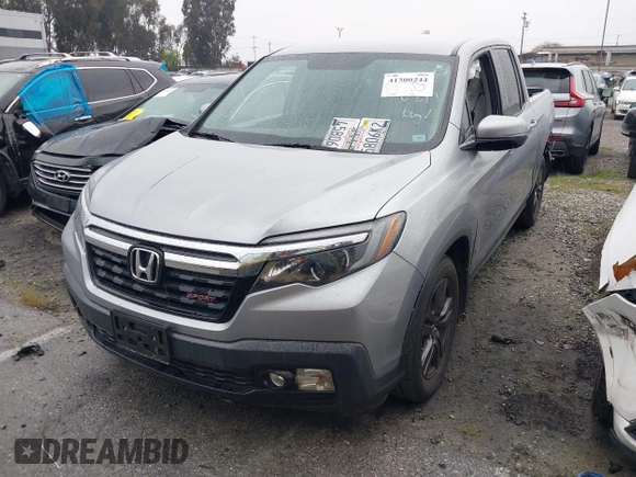 2018 Honda Ridgeline Sport with VIN 5FPYK2F19JB000713, listed as a IAAI auction lot 41300244 with 52,119 mi miles and . Bid and sale history available at DreamBid. Image 2.