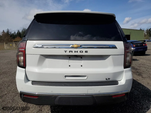 2021 Chevrolet Tahoe LT with VIN 1GNSKNKD5MR123270, listed as a Copart auction lot 52361495 with 107,921 mi miles and Salvage Title. Bid and sale history available at carsss.com. Image 6.