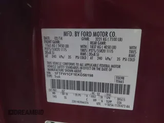2014 Ford F-150 XL with VIN 1FTFW1CF1EKD58198, listed as a IAAI auction lot 42086106 with 401,943 mi miles. Bid and sale history available at carsss.com. Image 9.