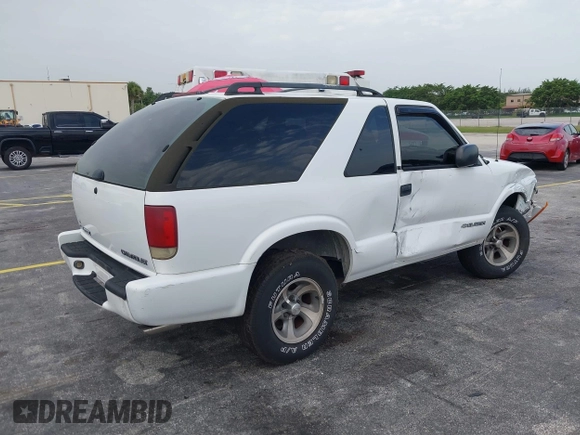 2003 Chevrolet Blazer Xtreme z VIN 1GNCS18X33K152868, wystawiony jako IAAI lot #39801584 z przebiegiem 167 157 mil mil oraz . Historia ofert i sprzedaży dostępna na DreamBid. Obrazek 4.