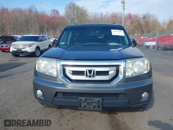 2011 Honda Pilot EX-L with VIN 5FNYF4H57BB107110, listed as a IAAI auction lot 42121356 with 300,169 mi miles and . Bid and sale history available at carsss.com. Image 12.