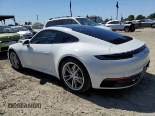 2024 Porsche 911 Carrera S z VIN WP0AB2A99RS219502, wystawiony jako Copart lot #49805545 z przebiegiem 4525 mil mil oraz Szkody całkowita. Historia ofert i sprzedaży dostępna na DreamBid. Obrazek 2.