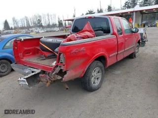 1998 Ford F-150 Standard with VIN 1FTRX18L6WKB01340, listed as a IAAI auction lot 41566198 with 199,223 mi miles. Bid and sale history available at carsss.com. Image 4.