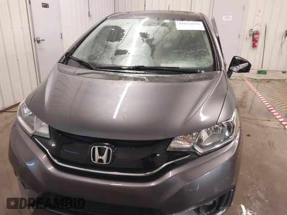 2015 Honda Fit EX-L with VIN 3HGGK5H85FM755006, listed as a IAAI auction lot 41034606 with 97,294 mi miles and . Bid and sale history available at DreamBid. Image 12.