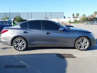 2015 Infiniti Q50 Premium with VIN JN1BV7APXFM333101, listed as a IAAI auction lot 41667109 with 112,477 mi miles and . Bid and sale history available at DreamBid. Image 14.