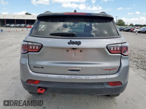 2020 Jeep Compass Trailhawk z VIN 3C4NJDDB6LT202919, wystawiony jako Copart lot #66373195 z przebiegiem 122 039 mil mil oraz Czysty tytuł • Clean title. Historia ofert i sprzedaży dostępna na DreamBid. Obrazek 6.