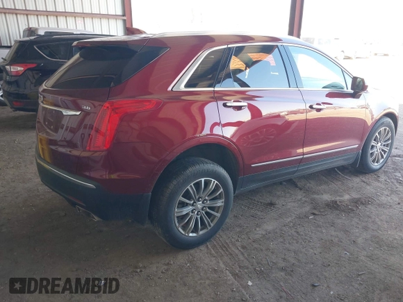 2017 Cadillac XT5 Luxury AWD with VIN 1GYKNDRS5HZ265570, listed as a IAAI auction lot 41915115 with 96,493 mi miles and . Bid and sale history available at DreamBid. Image 4.
