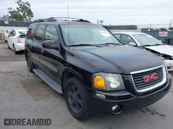 2003 GMC Envoy XL SLE with VIN 1GKES16S436167921, listed as a IAAI auction lot 42028489 with 226,750 mi miles. Bid and sale history available at carsss.com. Image 1.