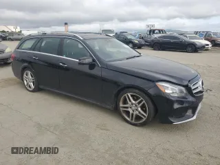 2015 Mercedes-Benz E 350 Luxury with VIN WDDHH8JB0FB083412, listed as a Copart auction lot 52053855 with 117,040 mi miles and Salvage title. Bid and sale history available at DreamBid. Image 4.