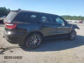 2014 Dodge Durango R/T with VIN 1C4SDJCT9EC596160, listed as a Copart auction lot 58034505 with 140,674 mi miles and Salvage title. Bid and sale history available at DreamBid. Image 3.