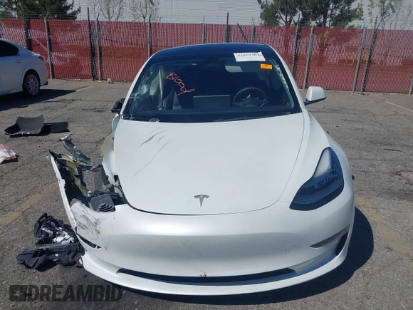 2022 Tesla Model 3 Long Range with VIN 5YJ3E1EB7NF298456, listed as a IAAI auction lot 41859304 with Not Provided miles and . Bid and sale history available at DreamBid. Image 12.