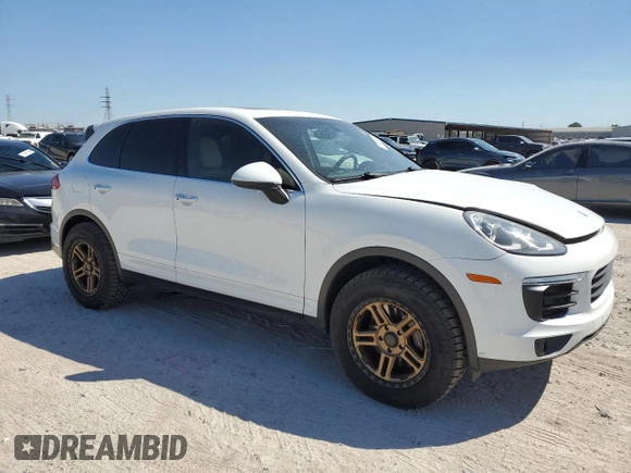 2016 Porsche Cayenne with VIN WP1AA2A28GLA08786, listed as a Copart auction lot 73426344 with 188,759 mi miles and Salvage title. Bid and sale history available at DreamBid. Image 4.