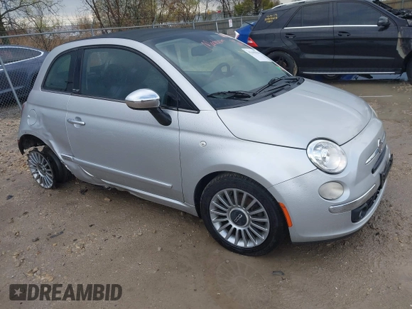 2012 FIAT 500 Lounge with VIN 3C3CFFER1CT148868, listed as a IAAI auction lot 42105829 with 82,746 mi miles and . Bid and sale history available at DreamBid. Image 1.