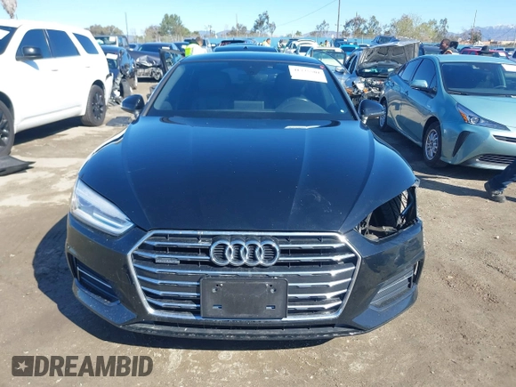 2018 Audi A5 Sportback Premium z VIN WAUANCF53JA009200, wystawiony jako IAAI lot #41725501 z przebiegiem 107 076 mil mil oraz . Historia ofert i sprzedaży dostępna na DreamBid. Obrazek 13.