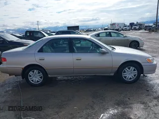2001 Toyota Camry CE with VIN 4T1BG22K51U860223, listed as a IAAI auction lot 41650629 with 219,328 mi miles. Bid and sale history available at carsss.com. Image 13.