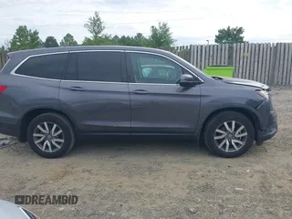 2019 Honda Pilot EX-L with VIN 5FNYF5H45KB018293, listed as a IAAI auction lot 42318481 with 76,617 mi miles and . Bid and sale history available at DreamBid. Image 13.